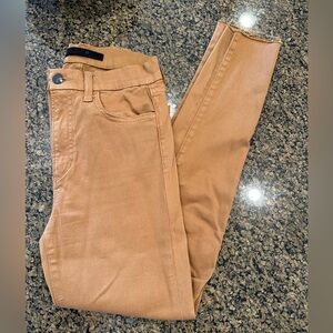 Coated camel jeans